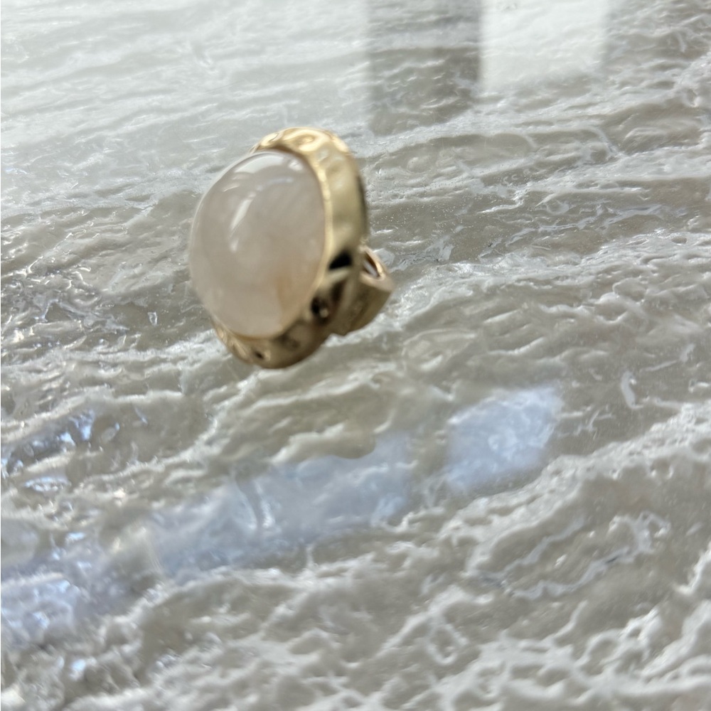 Elegant Gold and White Ring